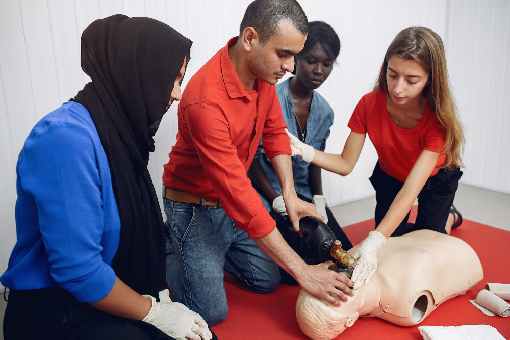 CPR training session with certified instructor, hands-on practice, and AED certification