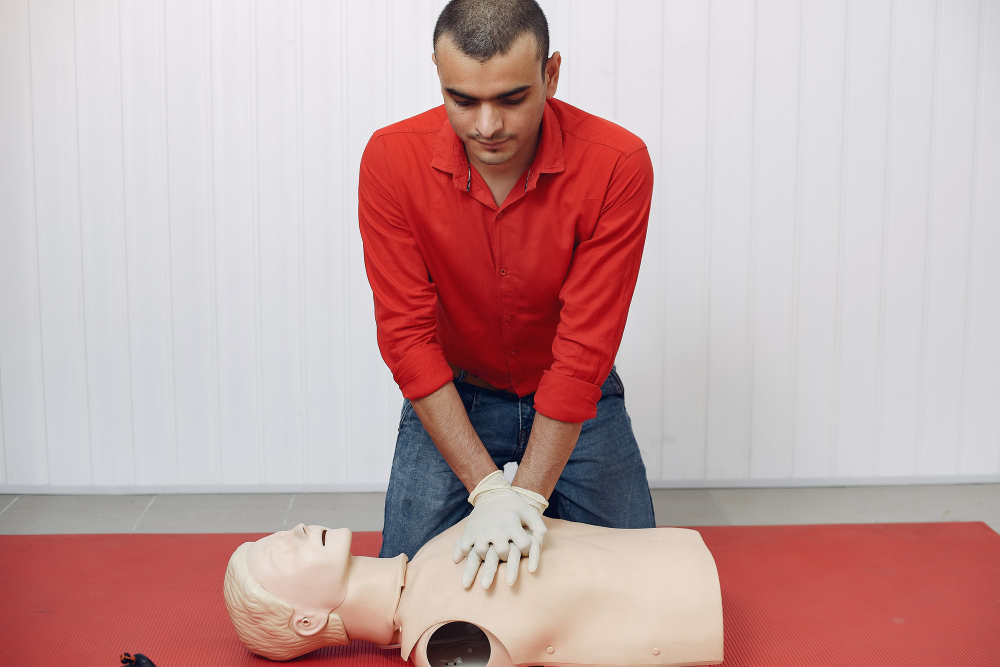 Person performing CPR chest compressions during an emergency situation